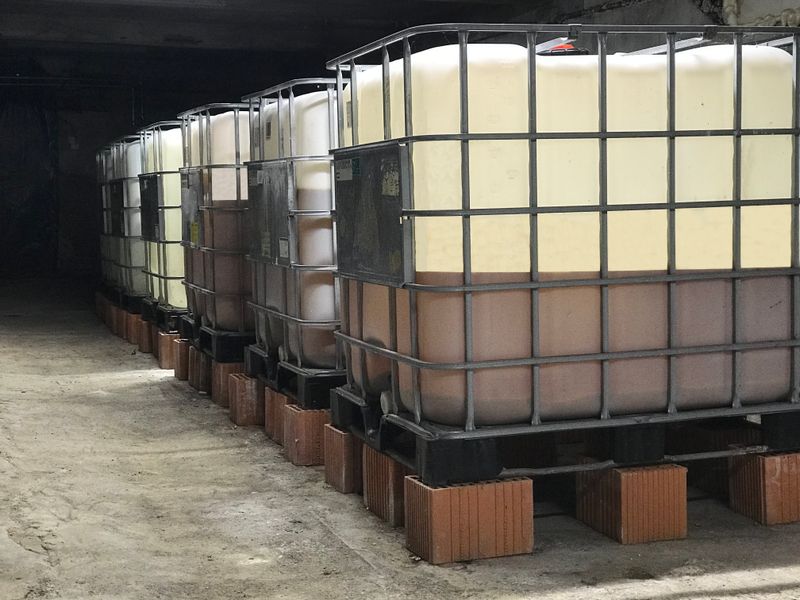 Image showing tanks of maturing apple cider vinegar in our fermentation room.